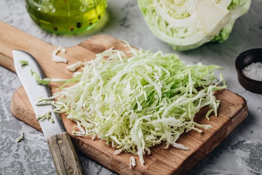 Fresh green cabbage cut. Sliced cabbage on the cutting board