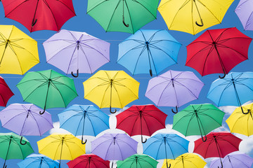 Fototapeta na wymiar Colorful umbrellas in the sky