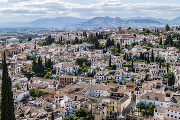 Beautiful aerial view city of Granada in a daytime. Granada - capital city of province of Granada, located at foot of Sierra Nevada Mountains. Granada, Andalusia, Spain.