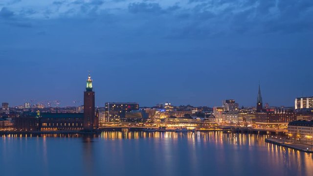 Stockholm city skyline day to night time lapse at Stockholm City Hall, Stockholm Sweden 4K Time Lapse