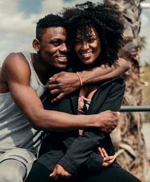 Young happy black couple outdoors