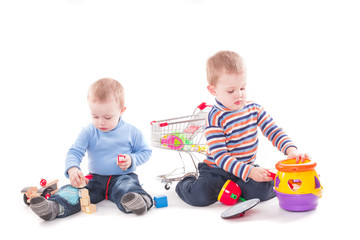 Funny kids playing educational toys