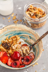 Homemade granola with yogurt and berries. Healthy food concept.