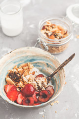 Homemade granola with yogurt and berries. Healthy food concept.