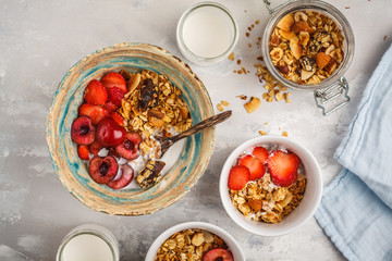 Homemade granola with yogurt and berries , top view. Healthy food concept.