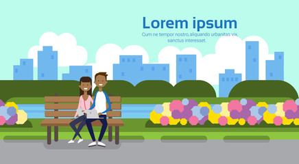 city park african couple man holding laptop woman sitting wooden bench green lawn flowers trees cityscape template background copy space horizontal flat vector illustration