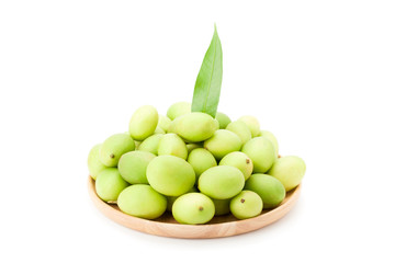 Plum Mango or Marian Plum fruits (Bouea macrophylla Griffith) in wooden plate