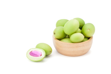 Plum Mango or Marian Plum fruits (Bouea macrophylla Griffith) in wooden bowl