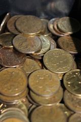 A lot of Russian coins at 50 cents close-up. Russian money horizontally
