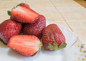 Harvest strawberries on a plate