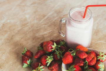Yogurt and strawberries with copy space