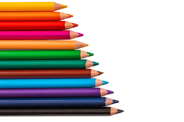 Color pencils, crayons with copy space isolated on white background