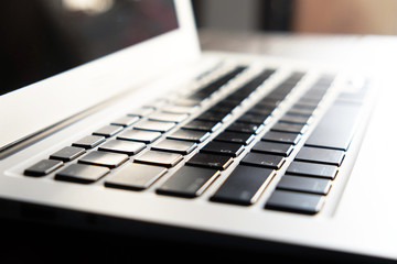 Close up of laptop keyboard with selective focus..
