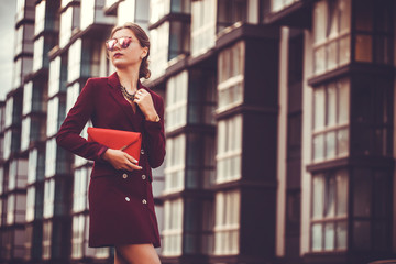 Business woman walking outside in city