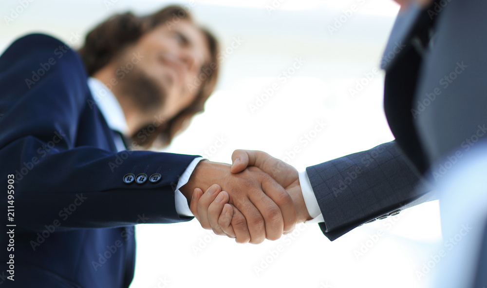 Poster Successful business people handshaking after good deal.