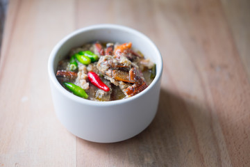 Crab stew in ceramic white bowl