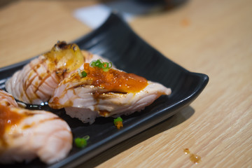 Close up of smoked salmon sushi