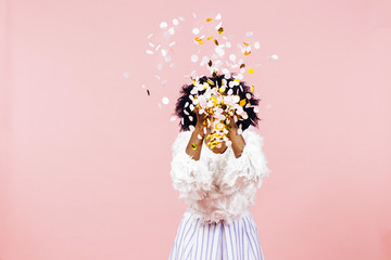 Woman throwing confetti in air - obrazy, fototapety, plakaty