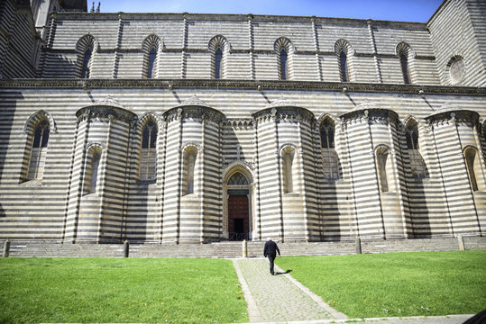 Cathedral of Orvieto, Italy. Right side characterized by two-colored marble stripes