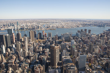 Elevated view from Empire State Building towards Manhattan, the East River side, with the iconic skyscrapers and urban dense development, in New York City, USA