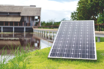 closeup solar panel with soft-focus and over light in the background