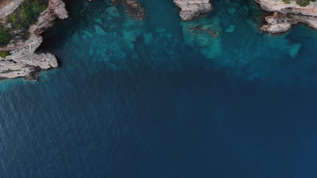 flight over rocky shore of Adriatic Sea, drone shot