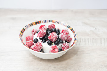 Tasty and delicious ice cream with berries