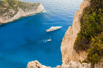 View from above on luxury boat sailing across the beautiful blue sea during summer time.  Colorful...