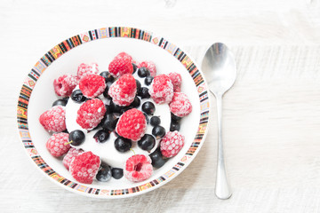 Tasty and delicious ice cream with berries
