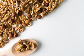 Walnuts, hazernuts, almond and cashew on a white background. Copy space. Selective focus