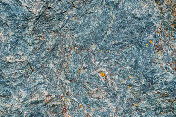 Texture of granite stone. Natural mountain stone. Blue shades of texture