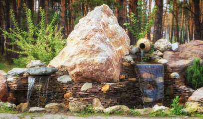 Krasofy fountain with two overflows, in antique style. Using natural materials such as wild marble, slate, granite and basalt