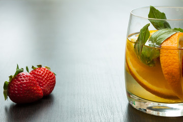 Fresh lemonade from a citrus with strawberry.