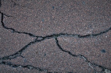 background of cracked asphalt, blue keel