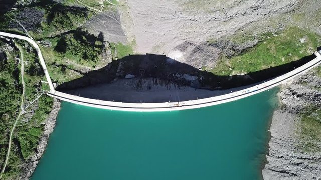Aerial view of the dam of the Lake Barbellino, an Alpine artificial lake. Italian Alps. Italy