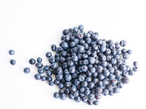 Fresh blueberries on a white background close up, soft focus. Summer wild berry
