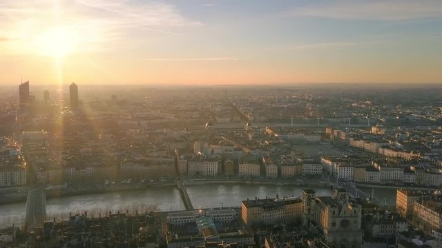 lyon city aerial view at sunrise flying over city center