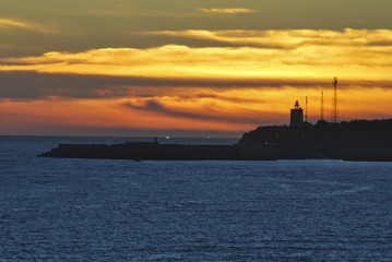 Obraz premium Sunset lighthouse