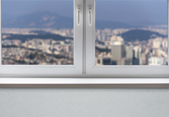 Window with Sill in living Apartments and urban View to the City