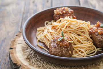 pasta with meatballs and parsley