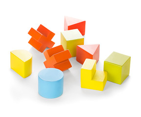 Obraz premium Multicolored children's educational toys on white background.