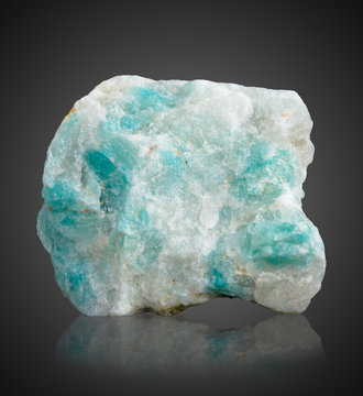 crystal of amazonite on a black background