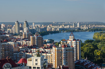 Fototapeta na wymiar Aerial view on river Dnepr in green Obolon area of Kyiv city