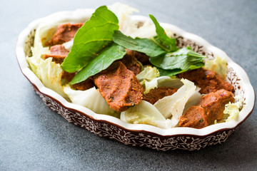 Turkish Food Cig Kofte with lettuce and Rocket Leaves or Arugula