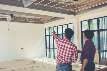 architect and engineer inspect housing estate building to success construction plan before send quality housing to customers
