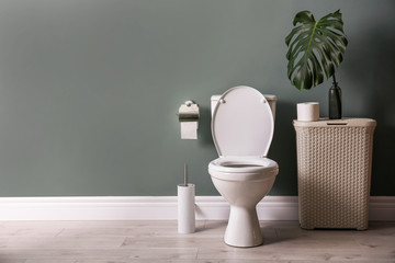 New ceramic toilet bowl in modern bathroom - obrazy, fototapety, plakaty