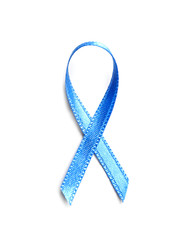 Blue ribbon on white background, top view. Cancer awareness