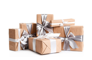 Obraz premium Beautifully wrapped gift boxes on white background