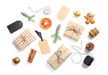 Fototapeta na wymiar Flat lay composition with Christmas gifts on white background