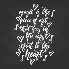 Music is the piece of art that goes in ears strait to heart - hand drawn Musical lettering phrase isolated on the black chalkboard background. Fun brush chalk vector quote for banners, poster design.